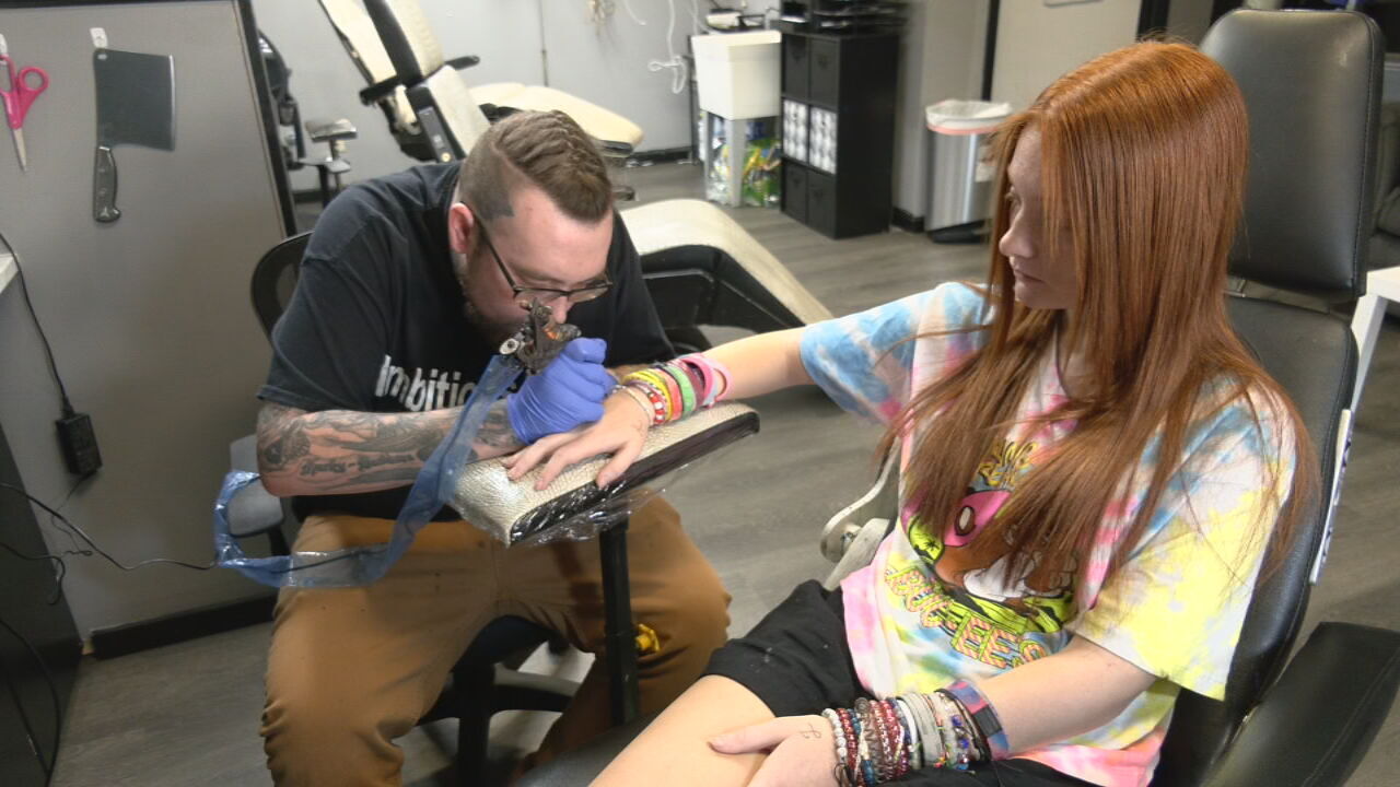 Scotty Thompson gives Lexie Morris tattoos at Ambitious Ink